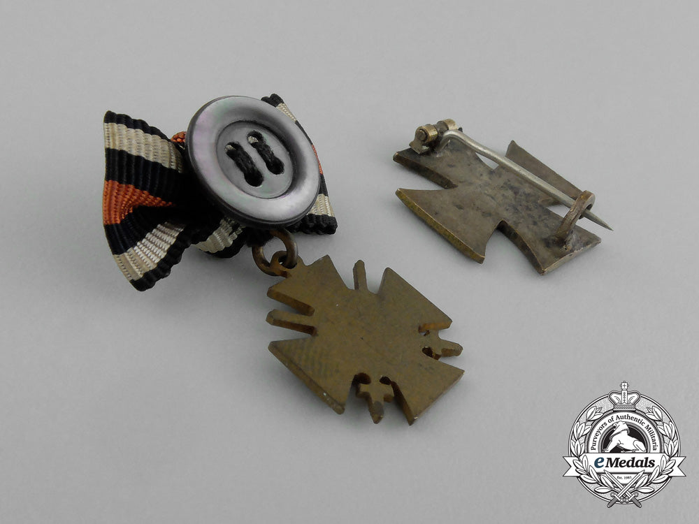 a_grouping_of_two_first_war_german_boutonnieres_and_badges_aa_0466