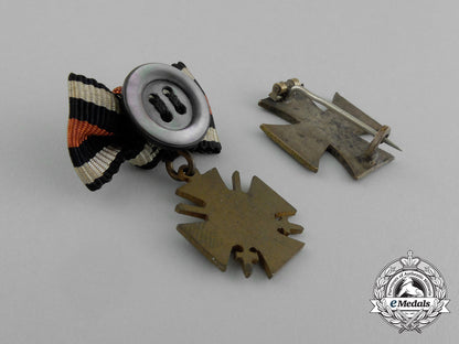 a_grouping_of_two_first_war_german_boutonnieres_and_badges_aa_0466