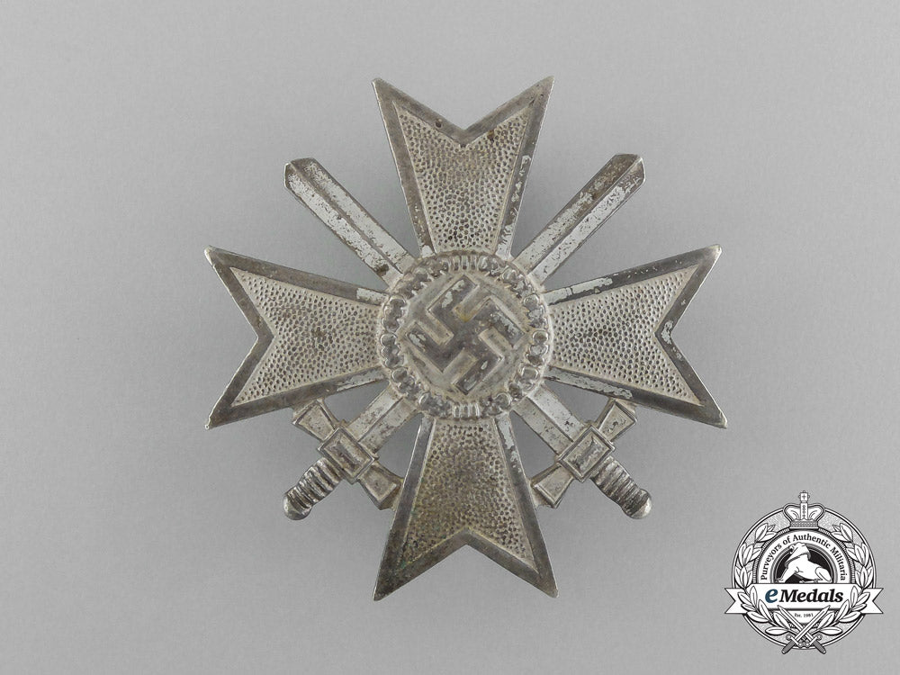 a_war_merit_cross_first_class_with_swords_in_its_original_case_of_issue_aa_0715