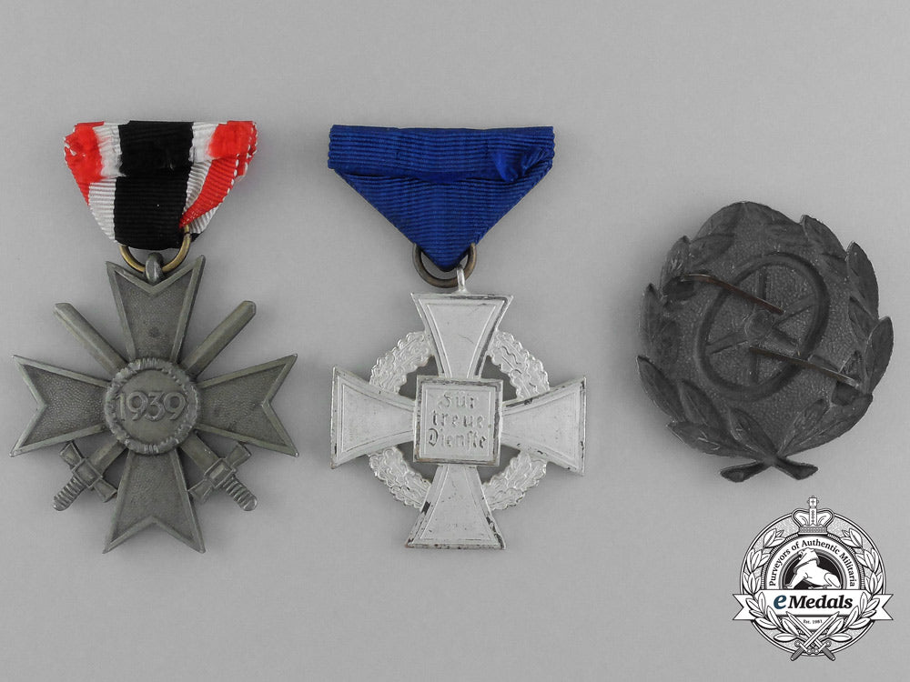 a_grouping_of_three_second_war_german_awards_and_decorations_aa_0746