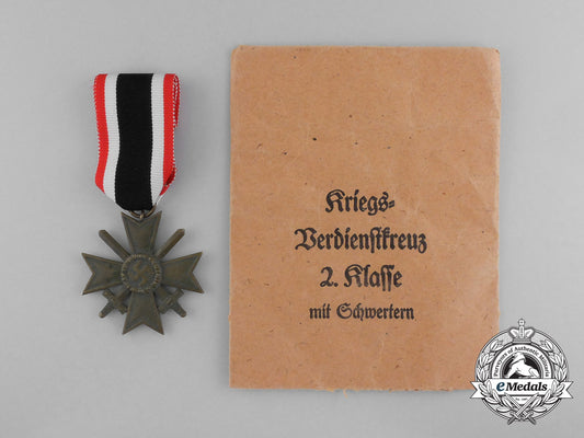 a_war_merit_cross_second_class_with_swords_in_its_original_packet_of_issue_by_wilhelm_deumer_aa_0800