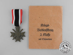 A War Merit Cross Second Class With Swords In Its Original Packet Of Issue By Wilhelm Deumer