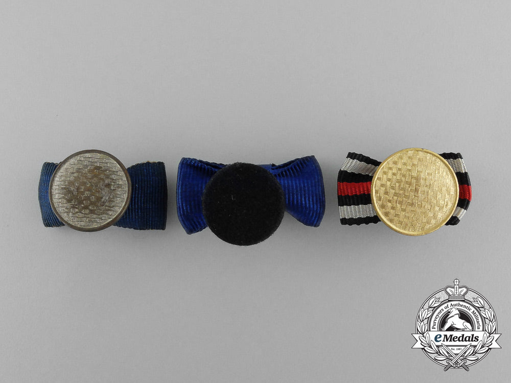 a_grouping_of_three_first_and_second_war_german_boutonnieres_aa_0816