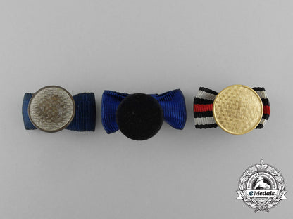 a_grouping_of_three_first_and_second_war_german_boutonnieres_aa_0816