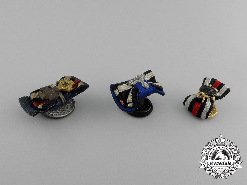 a_grouping_of_three_first_and_second_war_german_boutonnieres_aa_0817