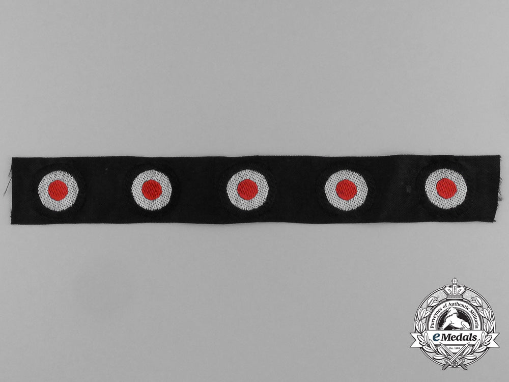 an_uncut_section_of_five_uncut_panzer_overseas_cap_cockades_aa_0870