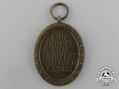 a_german_defence_wall(_west_wall)_medal_with_e._f._wiedmann_of_frankfurt_aa_0914