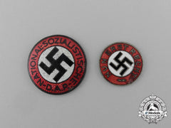 A Grouping Of Two Nsdap Membership Badges
