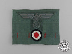 A Mint Wehrmacht Heer (Amy) Field Cap Insignia