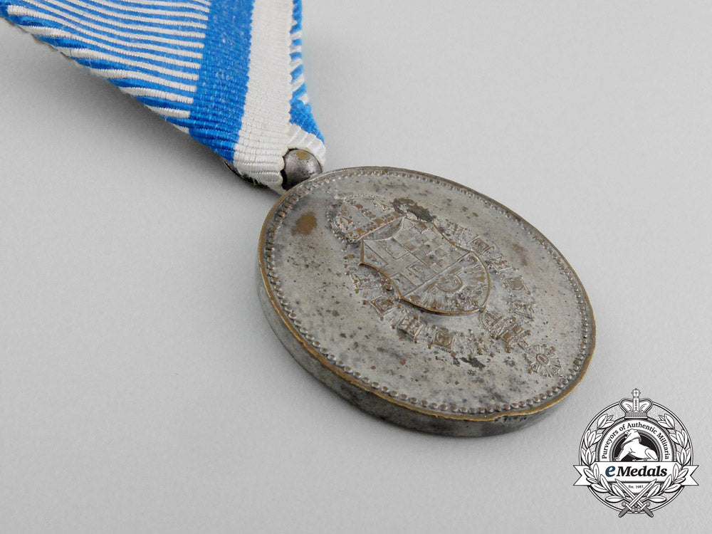 a_yugoslavian_medal_for_service_to_the_royal_household;_silver_grade_aa_1869