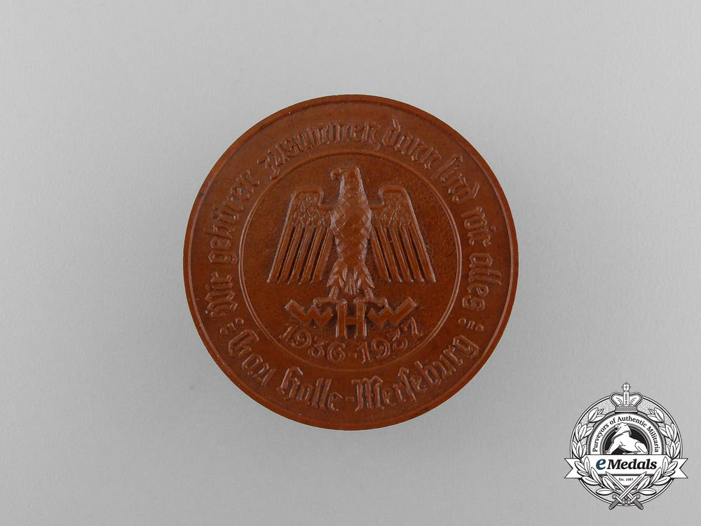 a1936/37_winter_relief_of_the_german_people_gau_halle-_merseburg_donation_badge_aa_2143