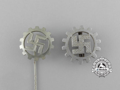 a_grouping_of_two_daf(_german_labour_front)_membership_badges_and_stick_pins_aa_3128