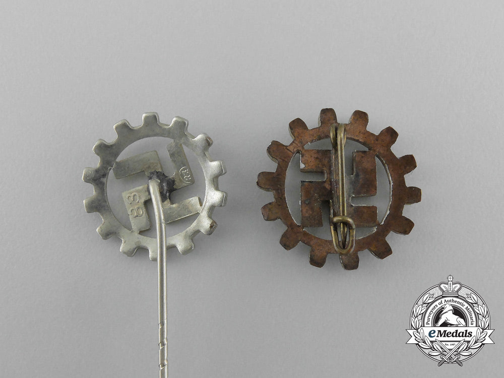 a_grouping_of_two_daf(_german_labour_front)_membership_badges_and_stick_pins_aa_3129