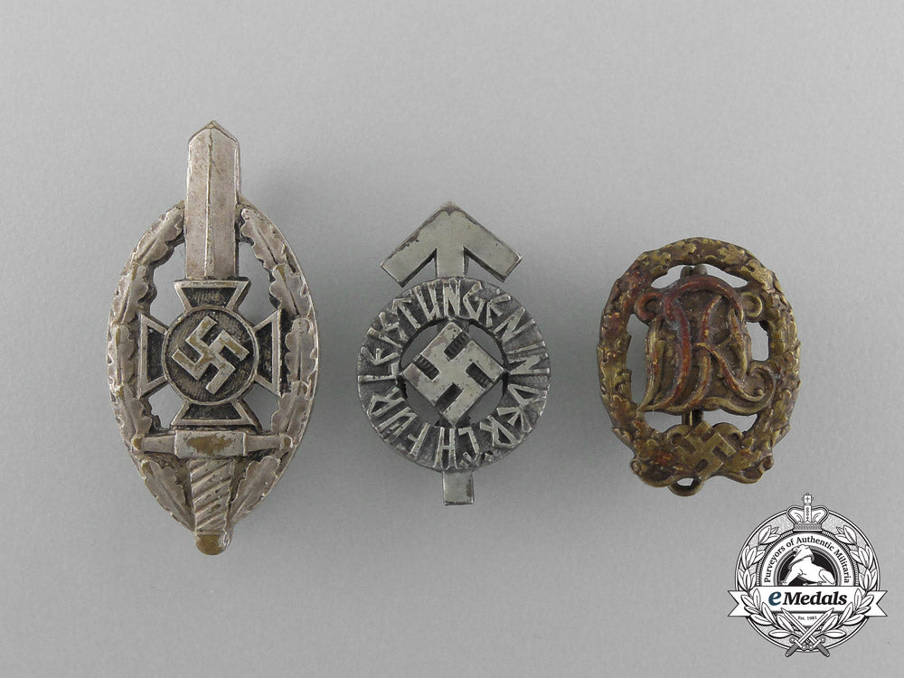 a_grouping_of_three_second_war_german_lapel_badges_aa_3148