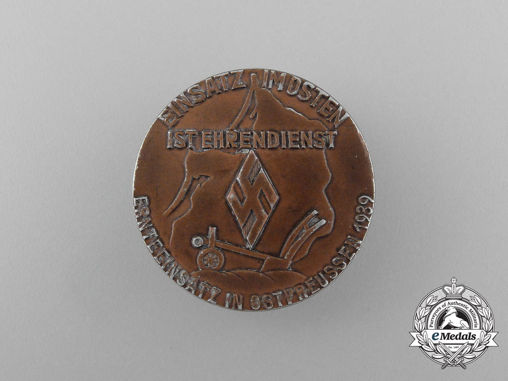 a1939_ns_german_student’s_league“_service_in_the_east_is_honourary_service”_badge_aa_3281