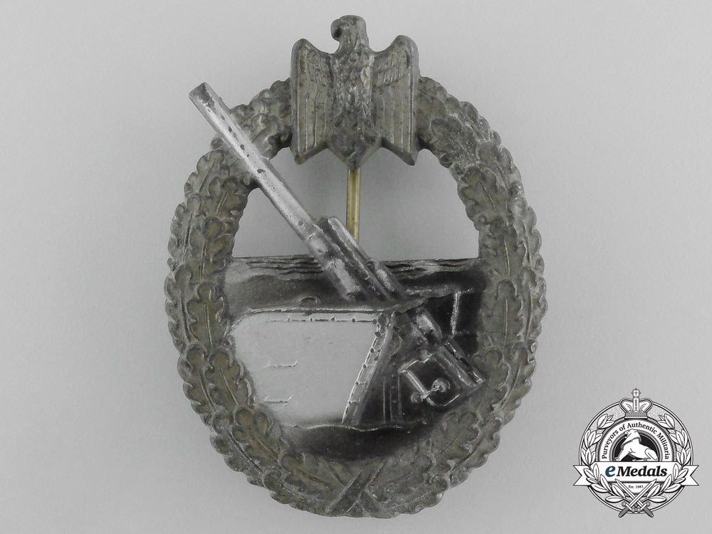 a_kriegsmarine_coastal_artillery_war_badge_by_hermann_aurich_aa_3843