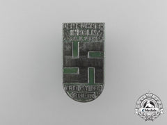 A 1936 “The Führer In Cologne - The Rhein Is Free” Badge