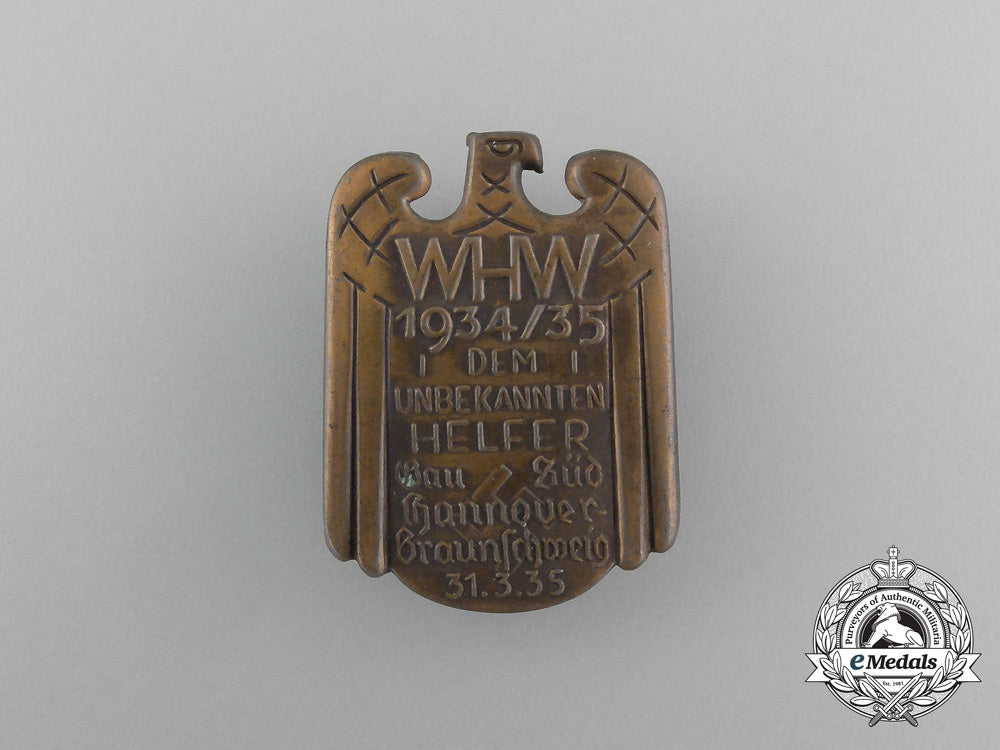 a1934/35_whw(_winter_aid_of_the_german_people)_donation_badge_aa_3941