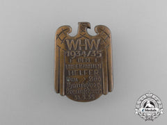 A 1934/35 Whw (Winter Aid Of The German People) Donation Badge