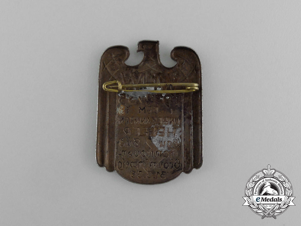 a1934/35_whw(_winter_aid_of_the_german_people)_donation_badge_aa_3942