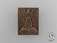 A 1934/35 Whw (Winter Aid Of The German People) Magdeburg Donation Badge