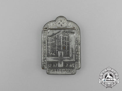 a1938_exhibition_of_the_occupational_school_and_it’s4-_year_plan_badge_by_wurster_aa_3959