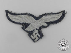 A Uniform Removed Luftwaffe Em/Nco’s Breast Eagle