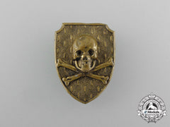 A Unidentified Free Corps “Death’s Skull” Cap Badge