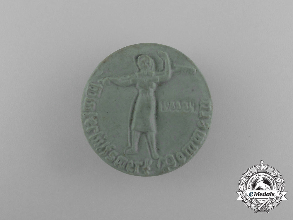 a1933/34_whw(_winter_relief_of_the_german_people)_donation_badge_aa_5283