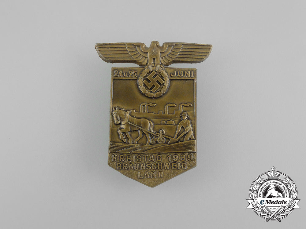 a1939_nsdap_district_council_day_of_the_braunschweig_region_badge_aa_5537