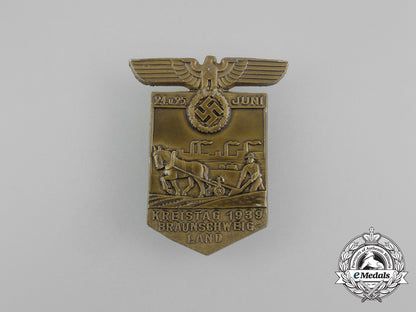 a1939_nsdap_district_council_day_of_the_braunschweig_region_badge_aa_5537