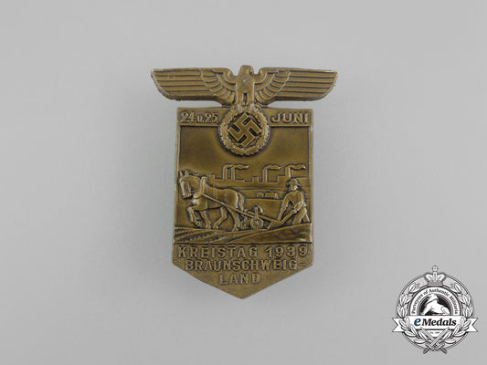 a1939_nsdap_district_council_day_of_the_braunschweig_region_badge_aa_5537