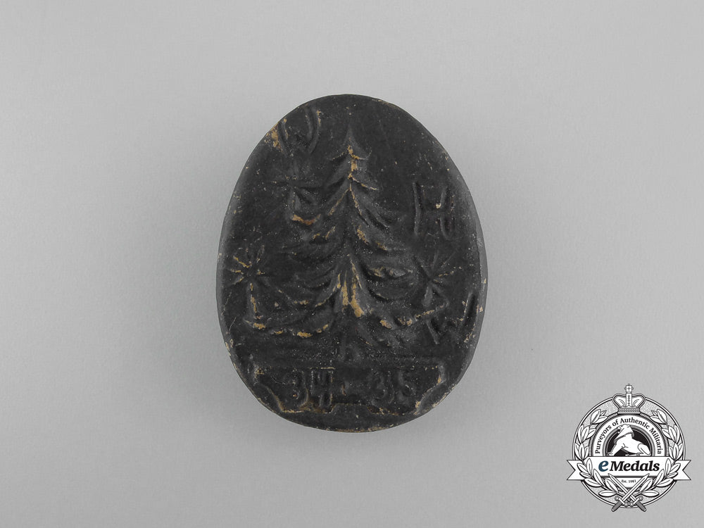 a1934/35_whw(_winter_relief_of_the_german_people)_donation_badge_aa_5545