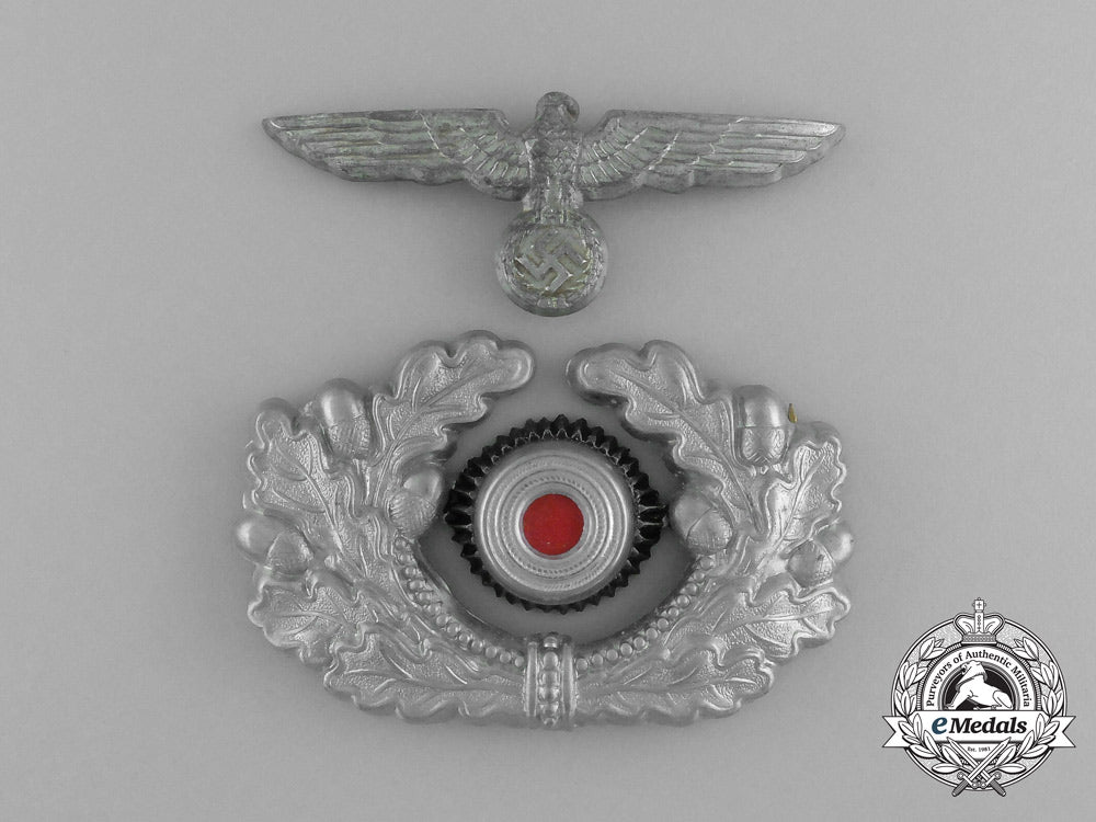 a_wehrmacht_heer(_army)_officer’s_visor_cap_insignia_aa_5911