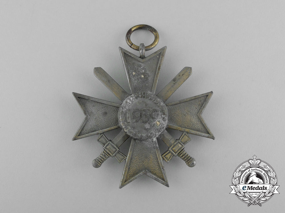 two_war_merit_crosses_with_swords_by_klein&_quenzer_and_otto_schinkle_aa_5970