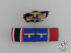 A Grouping Of A Second War German Ribbon Bar And A Boutonniere