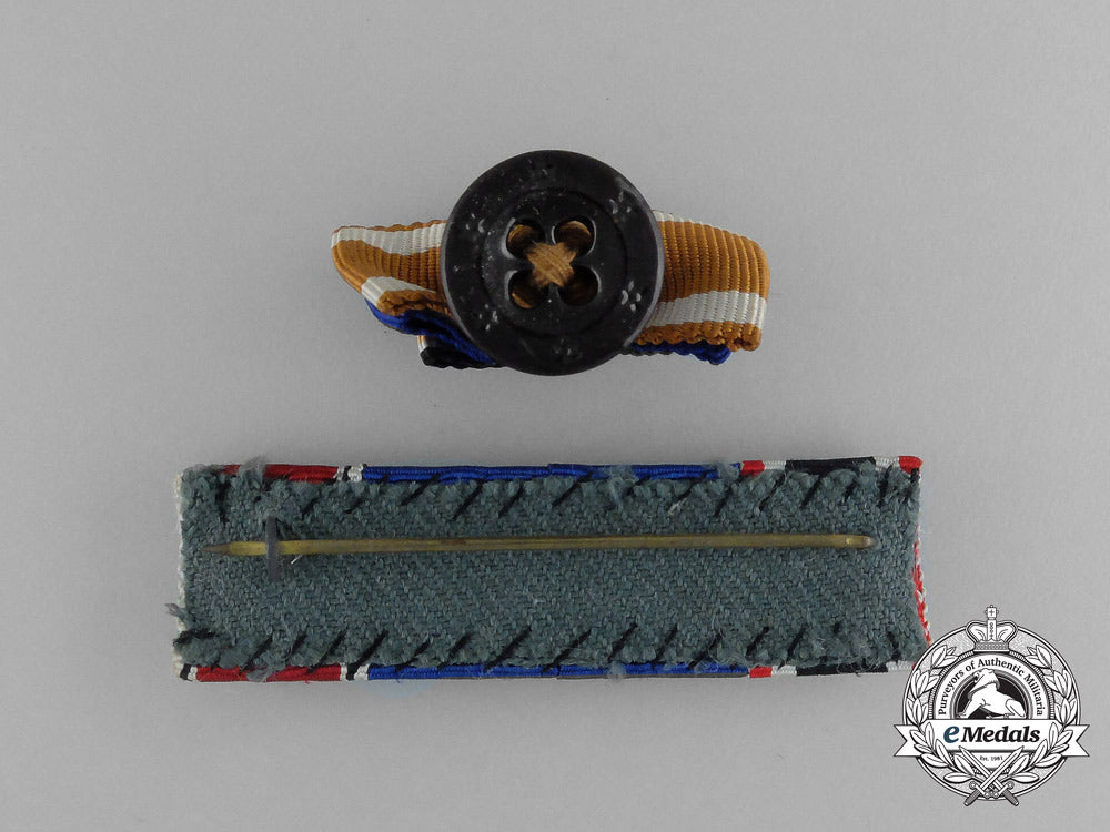 a_grouping_of_a_second_war_german_ribbon_bar_and_a_boutonniere_aa_6001
