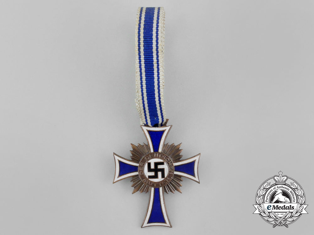 a_bronze_grade_cross_of_honour_of_the_german_mother_in_its_packet_of_issue_by_gebrüder_schmidt_aa_6491