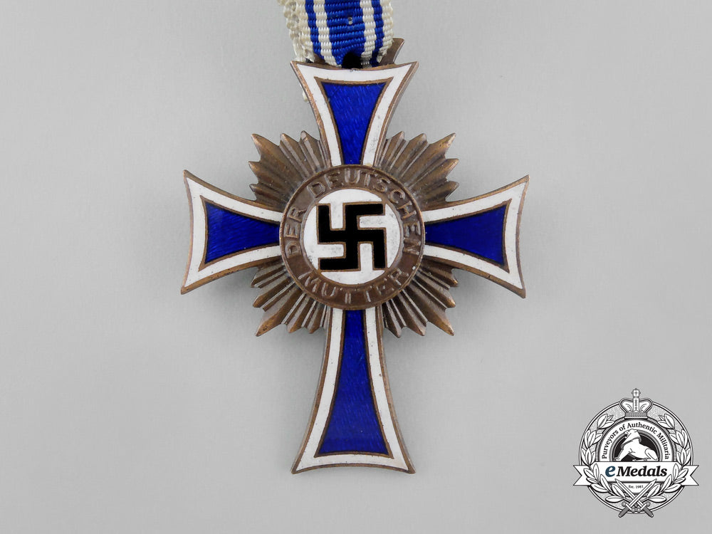 a_bronze_grade_cross_of_honour_of_the_german_mother_in_its_packet_of_issue_by_gebrüder_schmidt_aa_6492
