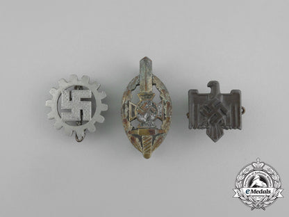 a_grouping_of_three_second_war_german_membership_badges_aa_6514