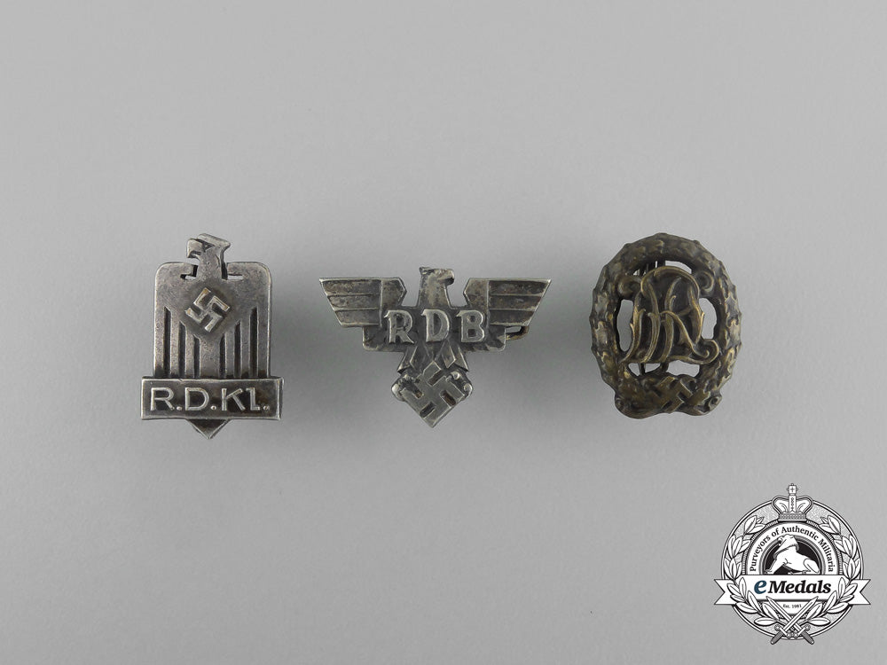 a_grouping_of_three_second_war_german_badges_aa_6520