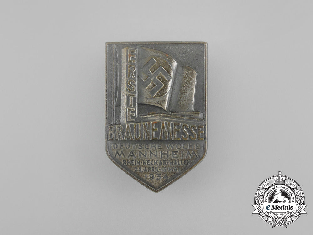germany,_nsdap._a1934_german_exhibition_week_in_mannheim_badge_aa_6625