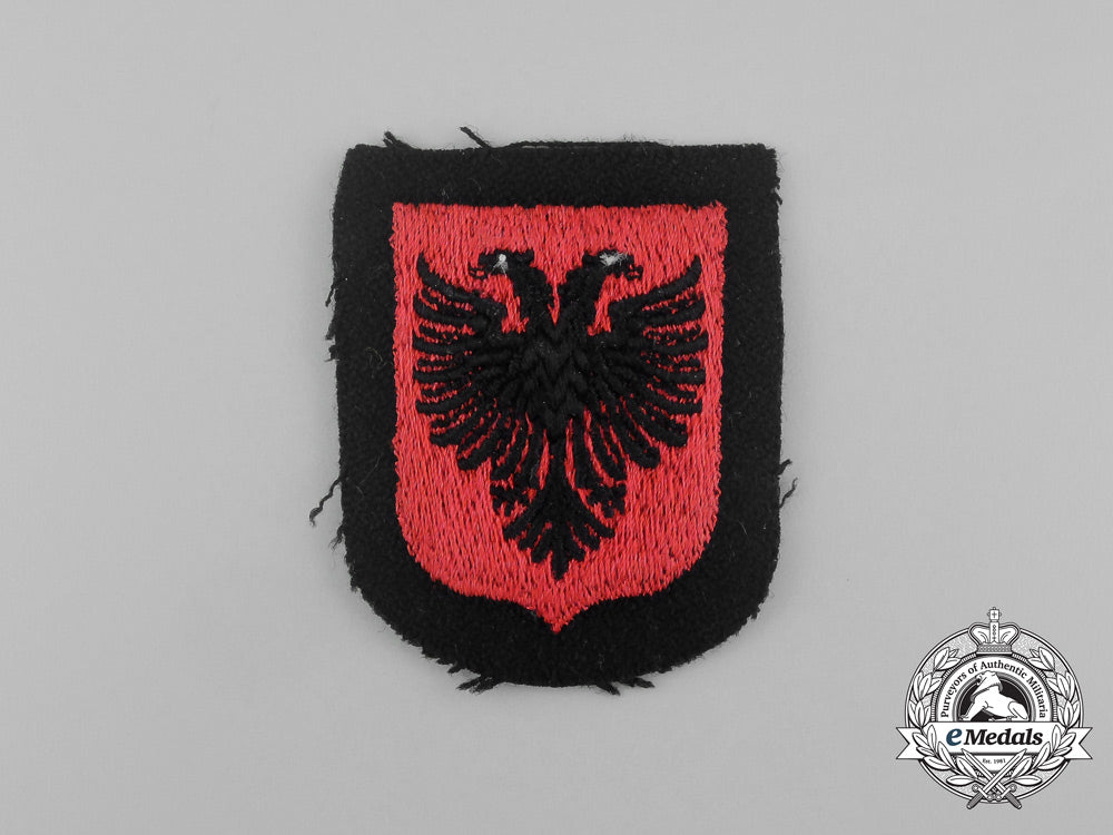 a_mint_and_unissued_albanian_waffen-_ss_volunteer_sleeve_shield_insignia_aa_7160