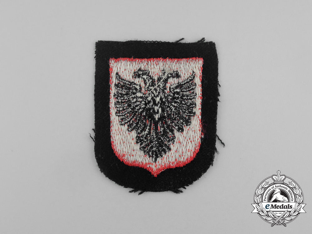 a_mint_and_unissued_albanian_waffen-_ss_volunteer_sleeve_shield_insignia_aa_7161