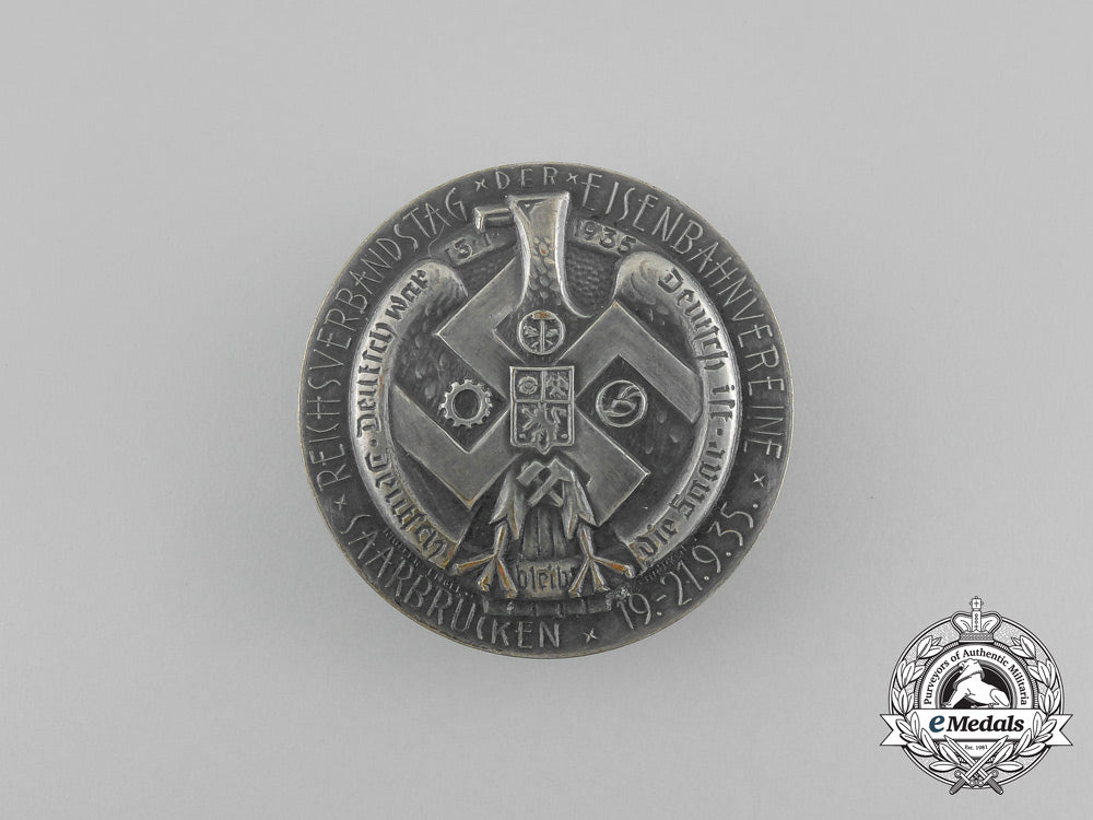 germany,_third_reich._a1935_saarbrücken_national_day_of_railway_associations_badge_aa_7220
