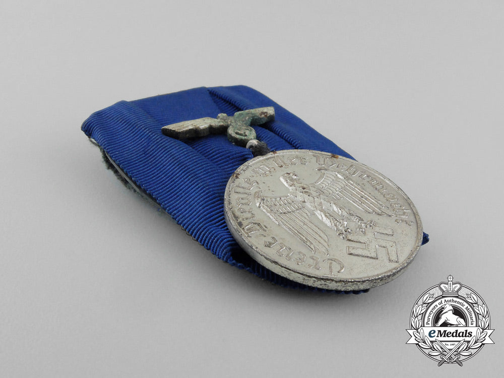 germany,_wehrmacht._a_long_service_medal_pair_with_ribbon_bar_aa_7643