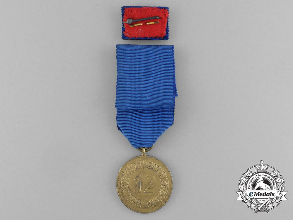 a_wehrmacht12-_year_long_service_medal_with_matching_boutonniere_and_ribbon_bar_aa_7655