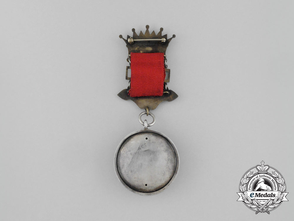 an_order_of_st._john_breast_badge_on_a_suspension_aa_8000
