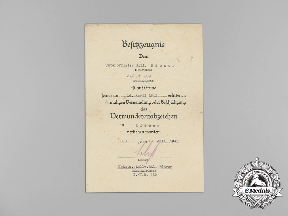 germany,_heer._a_gold_grade_wound_badge_document_group,_leningrad_combatant_aa_8495