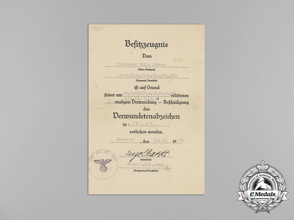 germany,_heer._a_gold_grade_wound_badge_document_group,_leningrad_combatant_aa_8497